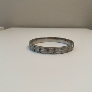 Silver rhinestone bangle.
